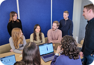 Neuron UX team collaborating in a conference room