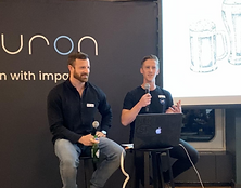 Neuron co-founders Mark Munroe and Matt Stoner giving presentation