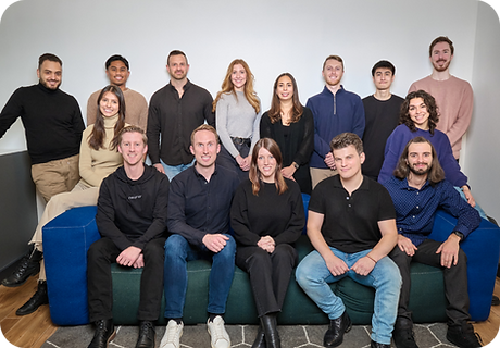 Neuron UX Team group photo in an office conference room